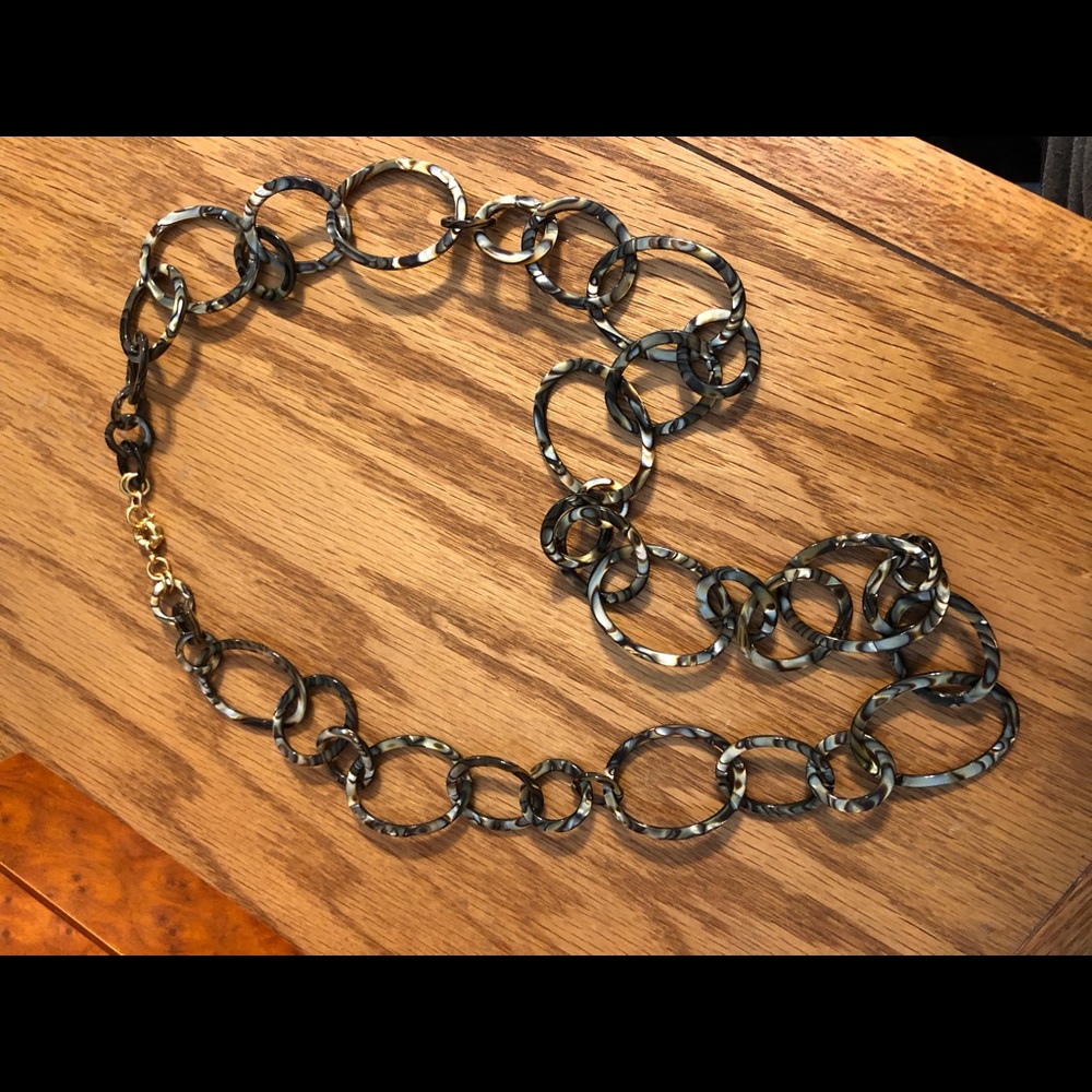 Graduating links amber tortoise necklace